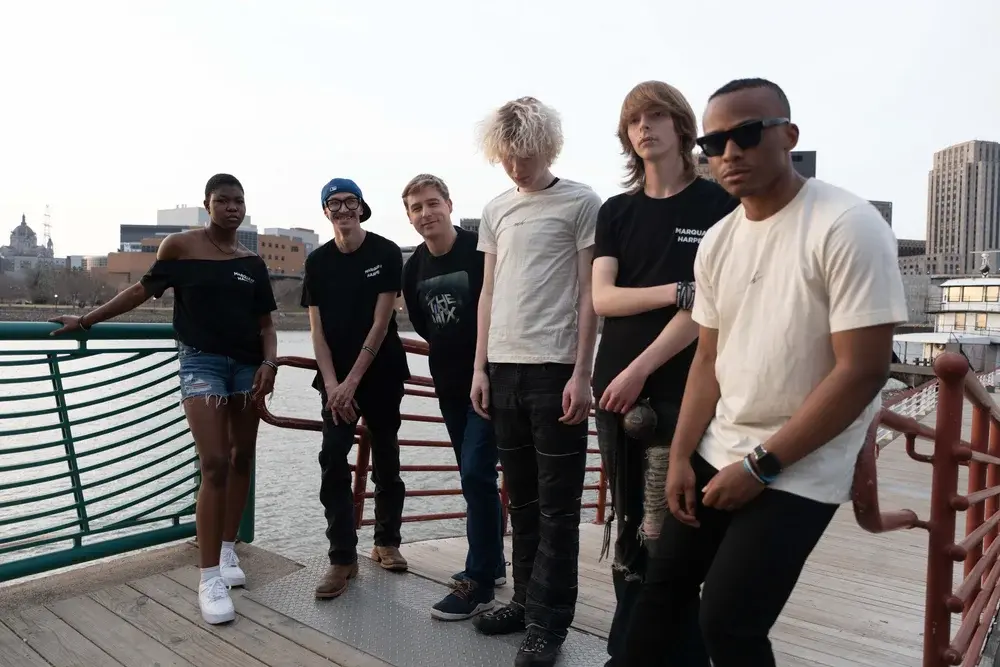 MH Nation standing together on a pier wearing Marquan Harper merchandise